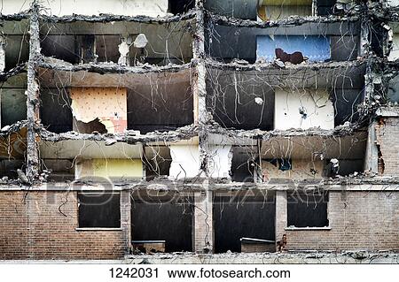 Stock Image - Council flats midway through demolition. Fotosearch