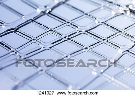 Detail of a grid structure made out of a liquid substance View Large Photo Image Stock Photo - Detail of a grid structure made out of a liquid substance. Fotosearch