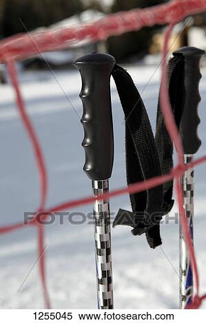 Stock Photography - Detail of two ski poles. Fotosearch