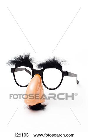 Groucho Marx novelty glasses on a white background View Large Photo Image Stock Image - Groucho Marx novelty glasses on a white background. Fotosearch