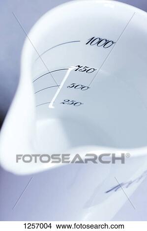 Measuring jug in chemist lab View Large Photo Image Picture - Measuring jug in chemist lab. Fotosearch