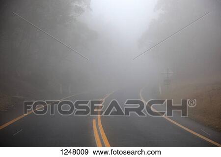 Stock Photo - Misty road in Jindabyne, New South Wales, Australia, . Fotosearch