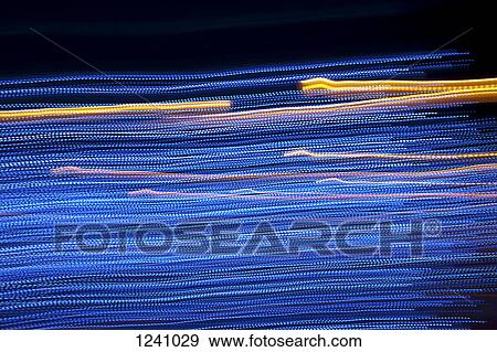 Multicolored illuminated light trails View Large Photo Image Stock Photo - Multicolored illuminated light trails. Fotosearch