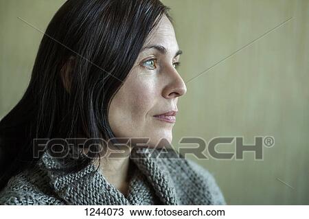Pensive woman looking into distance View Large Photo Image Stock Image - Pensive woman looking into distance. Fotosearch