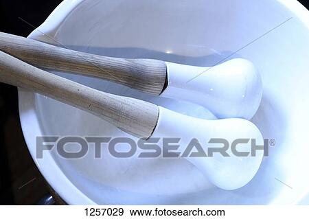 Pestles and mortar in pharmacy View Large Photo Image Stock Photo - Pestles and mortar in pharmacy. Fotosearch