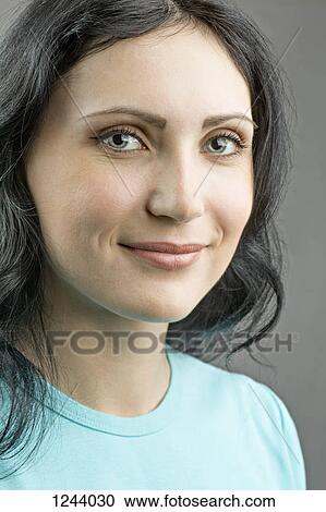 Stock Image - Portrait of beautiful woman. Fotosearch