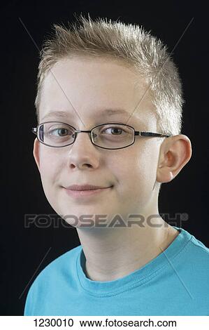 Stock Image - Portrait of smiling boy. Fotosearch