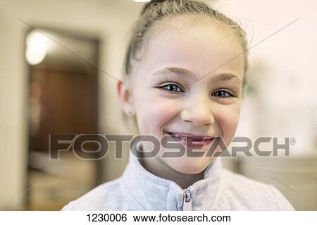 Portrait of smiling girl View Large Photo Image Stock Photograph - Portrait of smiling girl. Fotosearch