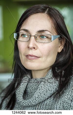 Portrait of woman with glasses View Large Photo Image Stock Image - Portrait of woman with glasses. Fotosearch