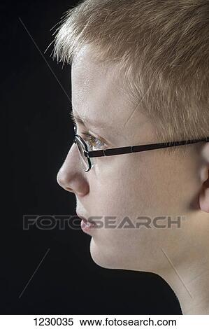 Profile of contemplative boy View Large Photo Image Stock Photography - Profile of contemplative boy. Fotosearch
