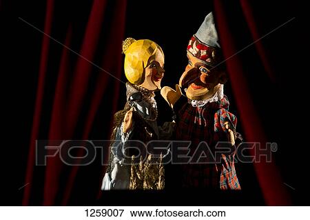 Punch and Judy from the classic puppet show performing a scene View Large Photo Image Stock Photo - Punch and Judy from the classic puppet show performing a scene. Fotosearch
