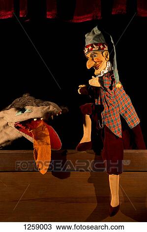 Punch from the classic puppet show Punch and Judy sits happily next to his dog View Large Photo Image Stock Image - Punch from the classic puppet show Punch and Judy sits happily next to his dog. Fotosearch