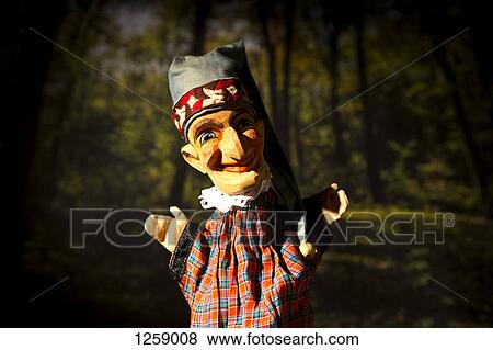 Punch from the classic puppet show Punch and Judy standing on stage View Large Photo Image Stock Photo - Punch from the classic puppet show Punch and Judy standing on stage. Fotosearch