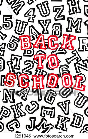 Stock Photography - Red outlined varsity font stickers spelling Back To School on top of black outlined letters. Fotosearch