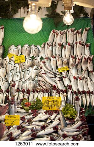 Stock Image - Sardines for sale at a fish market in Istanbul, Turkey. Fotosearch