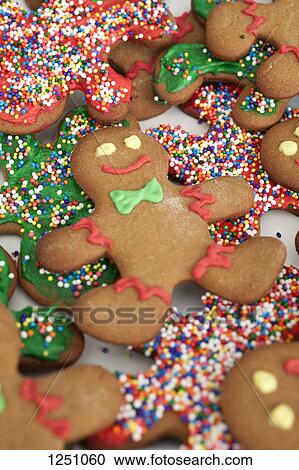 Various decorated gingerbread men cookies in a heap, close-up View Large Photo Image Stock Image - Various decorated gingerbread men cookies in a heap, close-up. Fotosearch
