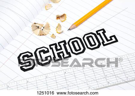 Varsity font stickers spelling out School atop a lined paper notebook with ruler and pencil View Large Photo Image Stock Photograph - Varsity font stickers spelling out School atop a lined paper notebook with ruler and pencil. Fotosearch