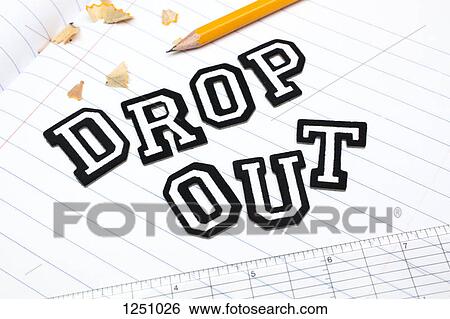 Stock Photograph - Varsity font stickers spelling out Dropout atop a lined paper notebook with ruler and pencil. Fotosearch