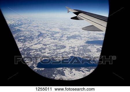 View of lakes within a snowy landscape from an airplane, Bavaria, Germany View Large Photo Image Stock Image - View of lakes within a snowy landscape from an airplane, Bavaria, Germany. Fotosearch