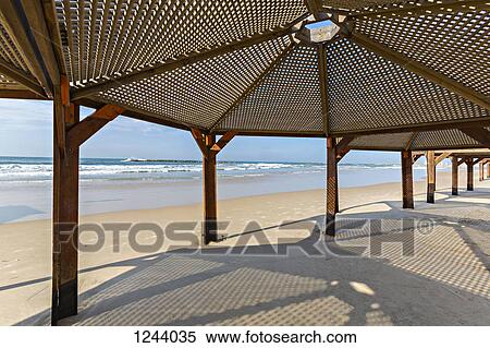 View of sea from under beach shelter in Voronezh, Russia View Large Photo Image Stock Photography - View of sea from under beach shelter in Voronezh, Russia. Fotosearch