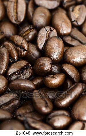 Stock Photo - Whole coffee beans, full frame. Fotosearch