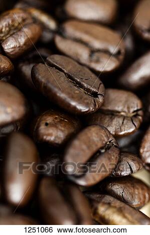 Stock Photograph - Whole coffee beans, full frame. Fotosearch