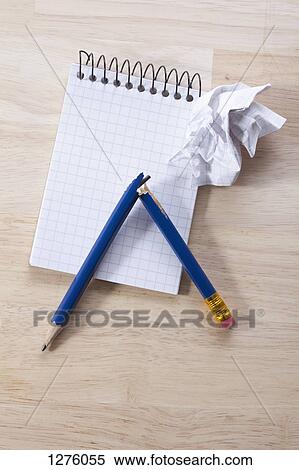 A blank notepad with a broken pencil and crumpled paper ball on it View Large Photo Image Stock Photography - A blank notepad with a broken pencil and crumpled paper ball on it. Fotosearch