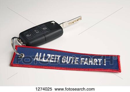 A car key and keychain with the phrase Always Drive Good in German Allzeit Gute Fahrt! View Large Photo Image Stock Photography - A car key and keychain with the phrase Always Drive Good in German Allzeit Gute Fahrt!. Fotosearch