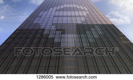 A Euro symbol on the windows of an office building, low angle view View Large Photo Image Stock Photography - A Euro symbol on the windows of an office building, low angle view. Fotosearch