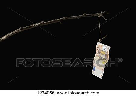 A fifty Euro banknote dangling from a crude fishing rod View Large Photo Image Stock Photograph - A fifty Euro banknote dangling from a crude fishing rod. Fotosearch
