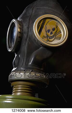 A gas mask with a skull and crossbones warning sign inside the mask View Large Photo Image Stock Photo - A gas mask with a skull and crossbones warning sign inside the mask. Fotosearch