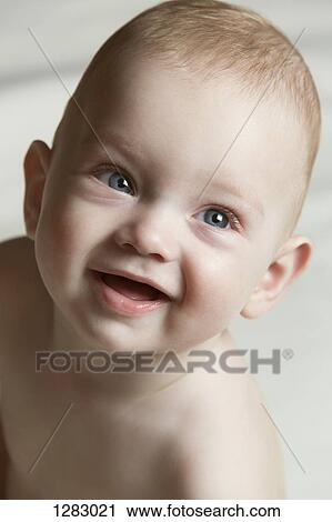 A happy baby boy looking up View Large Photo Image Stock Image - A happy baby boy looking up. Fotosearch