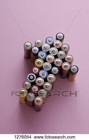 A large group of batteries arranged into the shape of an arrow, pointing up View Large Photo Image Picture - A large group of batteries arranged into the shape of an arrow, pointing up. Fotosearch