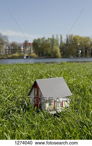 A miniature house on the lawn near the shore of a river View Large Photo Image Stock Image - A miniature house on the lawn near the shore of a river. Fotosearch