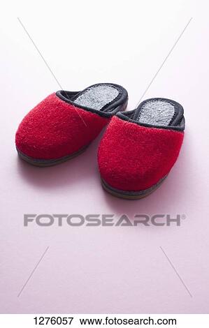 A pair of soft red slippers View Large Photo Image Stock Photo - A pair of soft red slippers. Fotosearch