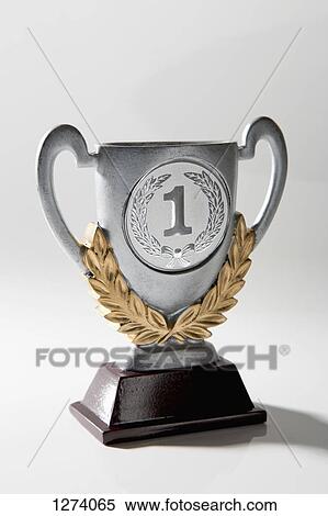 A silver first place trophy with gold laurel wreath embellishment View Large Photo Image Stock Photography - A silver first place trophy with gold laurel wreath embellishment. Fotosearch