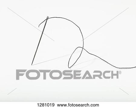 A threaded needle standing up View Large Photo Image Stock Photo - A threaded needle standing up. Fotosearch