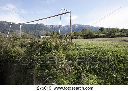 An old soccer goal post, mountains in background, Calacuccia, Corsica, France View Large Photo Image Stock Image - An old soccer goal post, mountains in background, Calacuccia, Corsica, France. Fotosearch