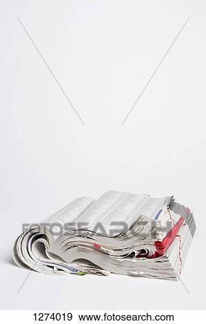 An open well-used white pages telephone book View Large Photo Image Stock Photo - An open well-used white pages telephone book. Fotosearch