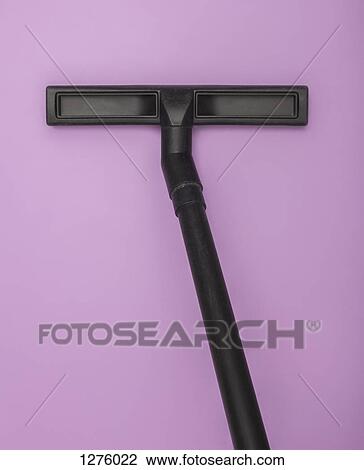 Angular vacuum cleaner hose against a lilac background View Large Photo Image Stock Image - Angular vacuum cleaner hose against a lilac background. Fotosearch