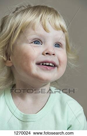 Blonde haired girl with amazed expression View Large Photo Image Picture - Blonde haired girl with amazed expression. Fotosearch
