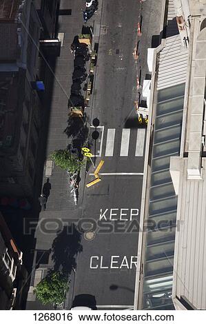 City road with 'Keep clear' road marking View Large Photo Image Stock Photograph - City road with 'Keep clear' road marking . Fotosearch