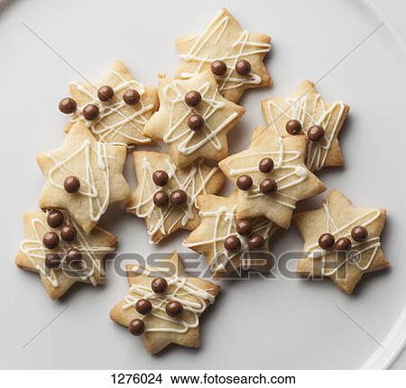 Cookies with chocolate toppings and icing drizzle View Large Photo Image Picture - Cookies with chocolate toppings and icing drizzle. Fotosearch