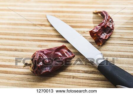 Dried chili and knife View Large Photo Image Stock Image - Dried chili and knife. Fotosearch