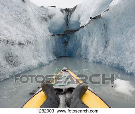 Kayaking between canal walls of Valdez Glacier, Alaska, USA View Large Photo Image Stock Image - Kayaking between canal walls of Valdez Glacier, Alaska, USA. Fotosearch