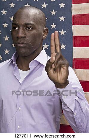 Man making the pledge of allegiance View Large Photo Image Stock Image - Man making the pledge of allegiance . Fotosearch