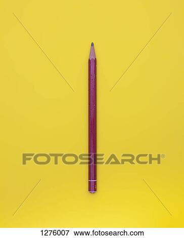 Pencil against yellow background View Large Photo Image Stock Photo - Pencil against yellow background. Fotosearch