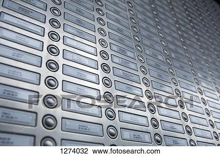 Rows of doorbells on a metal panel View Large Photo Image Stock Image - Rows of doorbells on a metal panel. Fotosearch