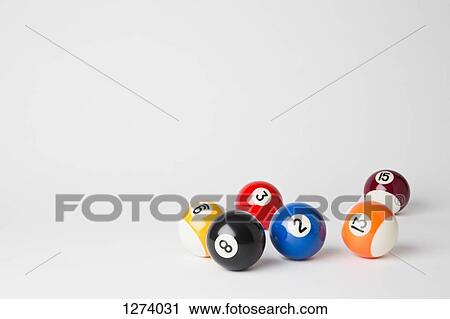 Six pool balls, including the eight ball, on a white surface View Large Photo Image Stock Image - Six pool balls, including the eight ball, on a white surface. Fotosearch