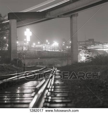 SkyTrain lines and railway track with 'East-Van' sign in background in Vancouver, Canada, View Large Photo Image Stock Photo - SkyTrain lines and railway track with 'East-Van' sign in background in Vancouver, Canada, . Fotosearch
